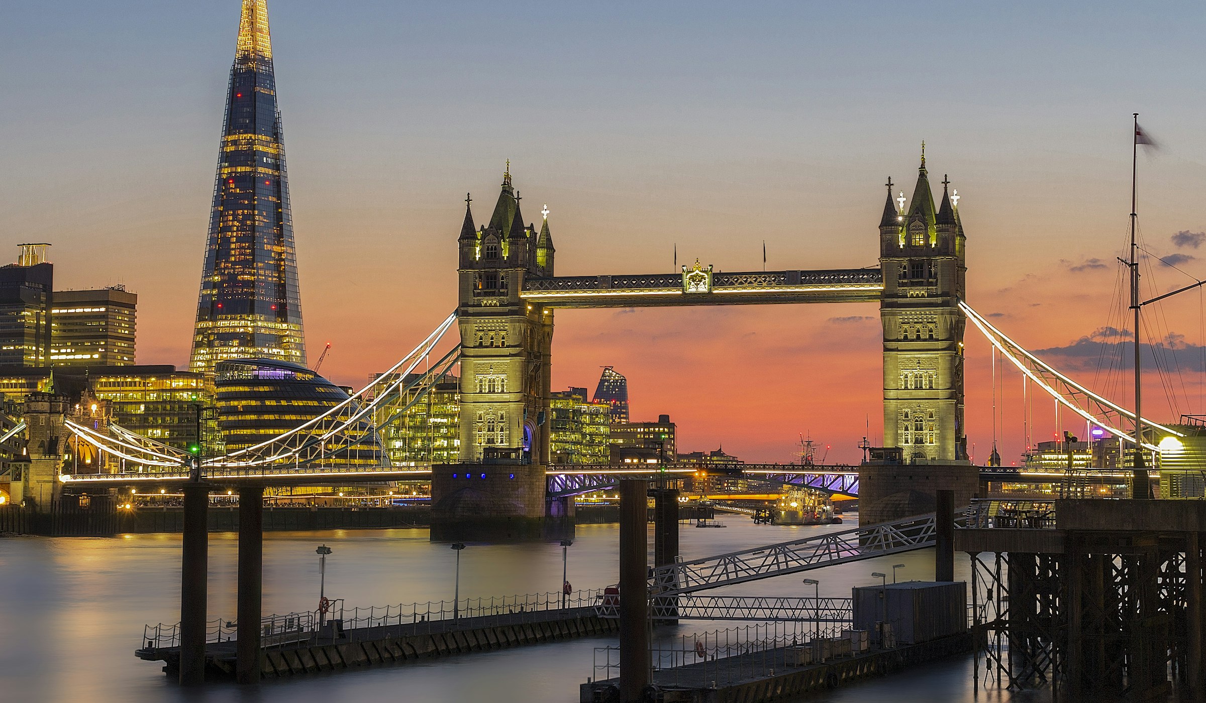 Tower Bridge and the City of London skyline at dusk